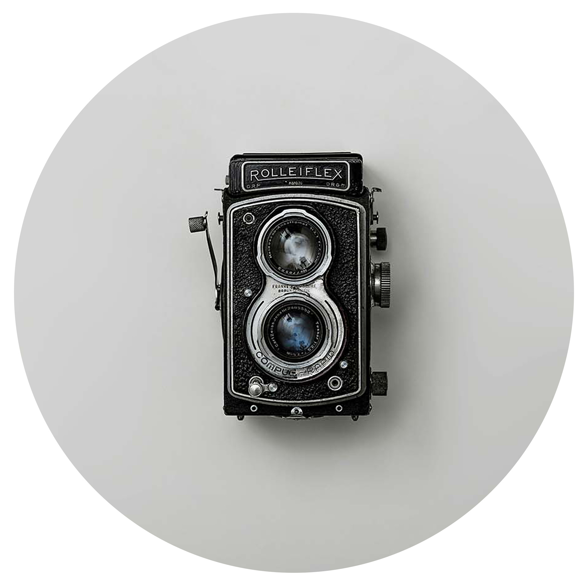 olden day camera on a grey background